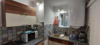 A kitchen or kitchenette at Kikötő Vendégház