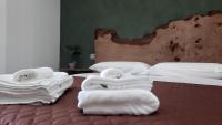 A bed or beds in a room at WiSaRelax