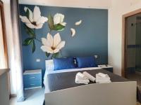 A bed or beds in a room at WiSaRelax