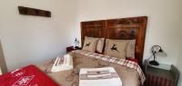 Posteľ alebo postele v izbe v ubytovaní Maison Venera - Relax Appartaments in Valtournenche
