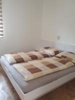 Posteľ alebo postele v izbe v ubytovaní Ivett apartmanház