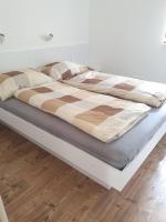 Posteľ alebo postele v izbe v ubytovaní Ivett apartmanház