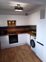 Kuchyňa alebo kuchynka v ubytovaní Apartamenty Kletówka