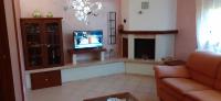 Televízia a/alebo spoločenská miestnosť v ubytovaní casa papillon