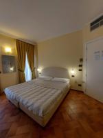 Posteľ alebo postele v izbe v ubytovaní Hotel Borgovico