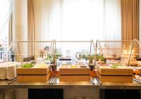 a table with several boxes of food on it at APA Hotel Kanazawa Ekimae in Kanazawa