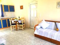 Postel nebo postele na pokoji v ubytování Evangelia House Sea View Apartments