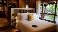 Tira Vilagna Suites & Spaにあるベッド