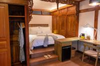 Tira Vilagna Suites & Spaにあるベッド