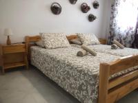Posteľ alebo postele v izbe v ubytovaní Seablue Relaxing Holiday Apartment