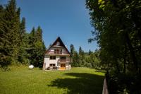 Vonkajšia záhrada v ubytovaní Apartamenty nad Potokiem