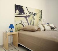 Posteľ alebo postele v izbe v ubytovaní Hotel Semeli