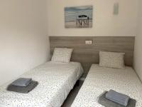 Posteľ alebo postele v izbe v ubytovaní Apartamentos Stil Mar Anna - Stil ideal Anna