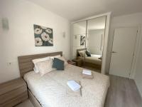 Posteľ alebo postele v izbe v ubytovaní Apartamentos Stil Mar Anna - Stil ideal Anna