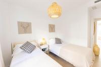 Posteľ alebo postele v izbe v ubytovaní CASA ROMAN new apartment at Baviera Golf