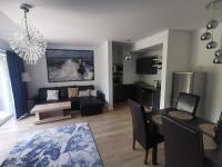 Telewizja i/lub zestaw kina domowego w obiekcie Apartament4siostry65