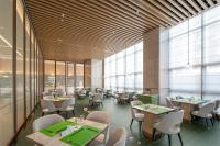 Un restaurante u otro lugar para comer en Holiday Inn Fuyang by IHG
