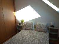 Posteľ alebo postele v izbe v ubytovaní Ocean View Malpica VUT