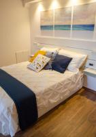 A bed or beds in a room at ARTEMIDE "Arco Antico" B&B SUITE SPA