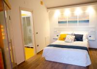 A bed or beds in a room at ARTEMIDE "Arco Antico" B&B SUITE SPA