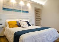 A bed or beds in a room at ARTEMIDE "Arco Antico" B&B SUITE SPA