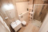 Kúpeľňa v ubytovaní Apartamenty City Center - Zdrojowe