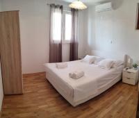 Postel nebo postele na pokoji v ubytování Apartments Villa Anna