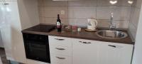 Kuchyň nebo kuchyňský kout v ubytování Apartments Villa Anna