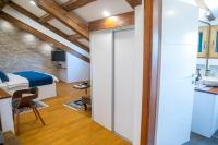 Kuchyň nebo kuchyňský kout v ubytování Oblivion Luxury Rooms