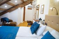 Postel nebo postele na pokoji v ubytování Oblivion Luxury Rooms