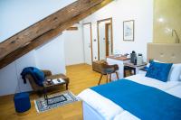 Postel nebo postele na pokoji v ubytování Oblivion Luxury Rooms