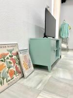Televízia a/alebo spoločenská miestnosť v ubytovaní Apartamentos - Alameda