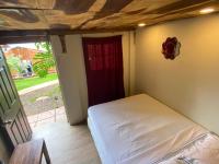 Captain Morgan Hostel Lake Coatepequeにあるベッド