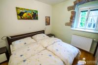 A bed or beds in a room at Appartements Steingasse