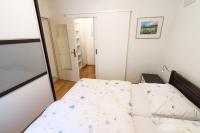 A bed or beds in a room at Appartements Steingasse