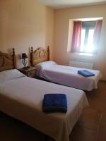 Postel nebo postele na pokoji v ubytování Casa Rural el Picozo