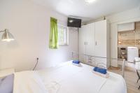 Posteľ alebo postele v izbe v ubytovaní Elena Apartments