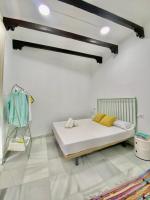 Posteľ alebo postele v izbe v ubytovaní Apartamentos - Alameda