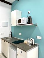 Kuchyňa alebo kuchynka v ubytovaní Apartamentos - Alameda