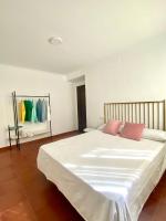 Posteľ alebo postele v izbe v ubytovaní Apartamentos - Alameda