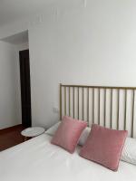 Posteľ alebo postele v izbe v ubytovaní Apartamentos - Alameda