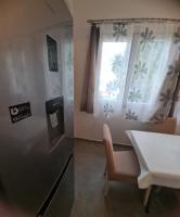 Kuchyňa alebo kuchynka v ubytovaní Apartman SPOT