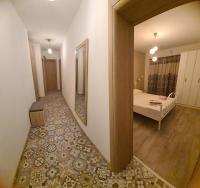 Posteľ alebo postele v izbe v ubytovaní Apartman SPOT