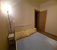 Posteľ alebo postele v izbe v ubytovaní Apartman SPOT