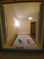 Posteľ alebo postele v izbe v ubytovaní Apartman SPOT