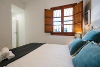 Postel nebo postele na pokoji v ubytování Encarnación Suite Apartment