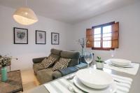 Posezení v ubytování Encarnación Suite Apartment