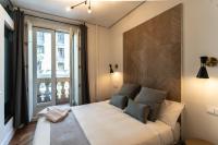 Postel nebo postele na pokoji v ubytování SUITES YOU Gran Vía