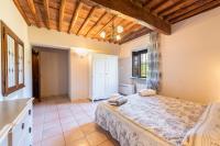 A bed or beds in a room at Villa Leone
