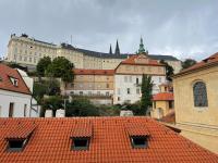 an overhead view of a city with red roofs at Hostel Little Quarter in Prague
